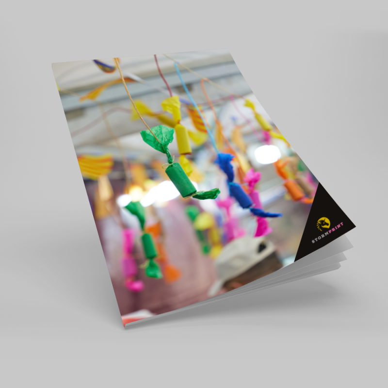 Revista tapa blanda encolada (rústica cosida)